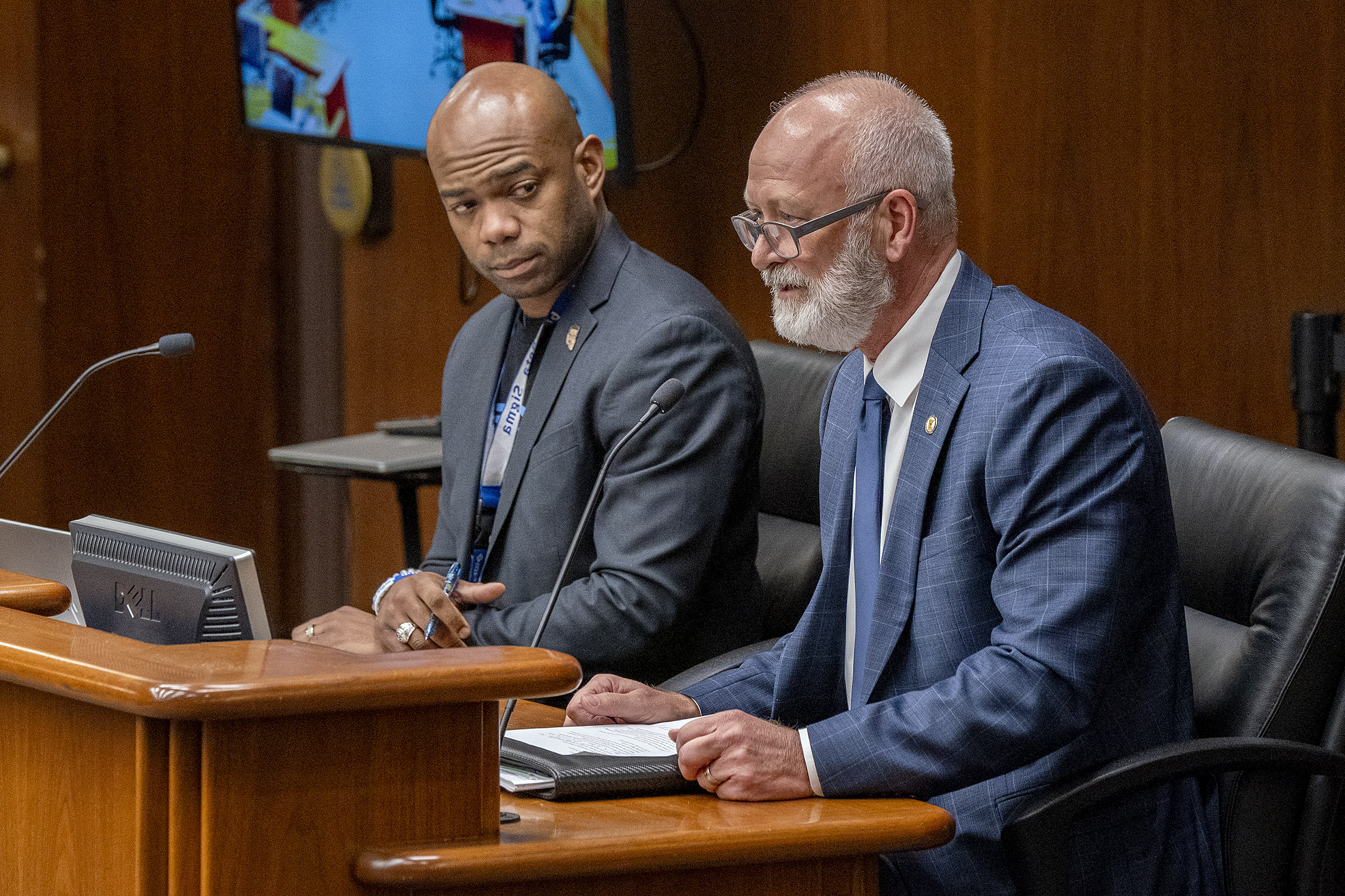 Public Safety Commissioner Bob Jacobson testifies before the House Education Policy Committee Feb. 12 regarding HF3489. Rep. Cedrick Frazier, left, is the bill sponsor. (Photo by Michele Jokinen)